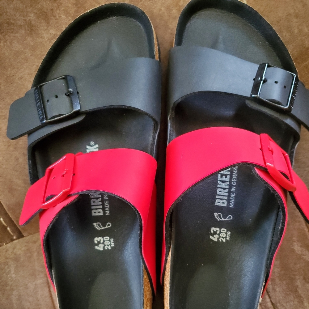 Red and black Birkenstock Arizona split